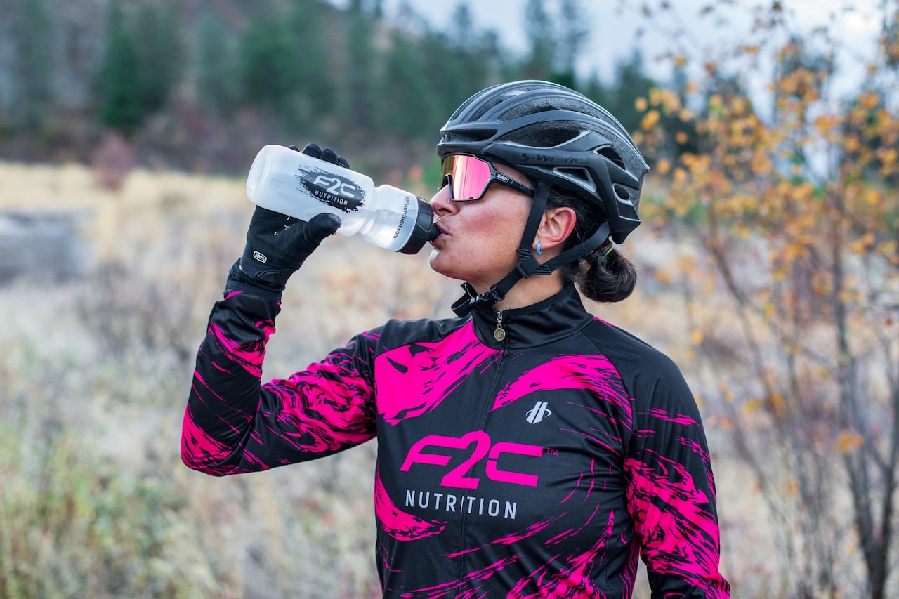 Female cyclist wearing custom designed cycling jersey