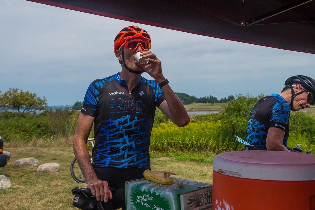cyclist drinking pickle juice